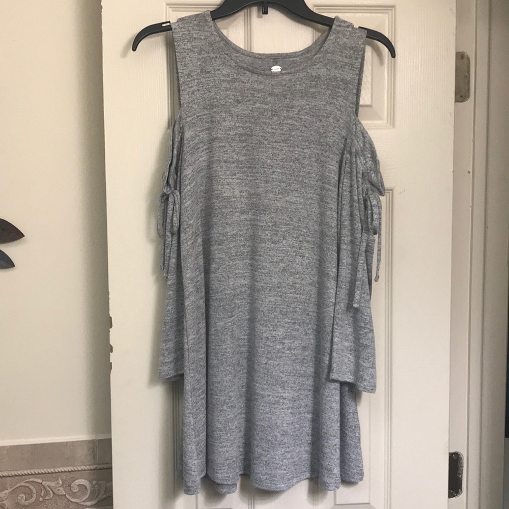 Cold shoulder tunic blouse.